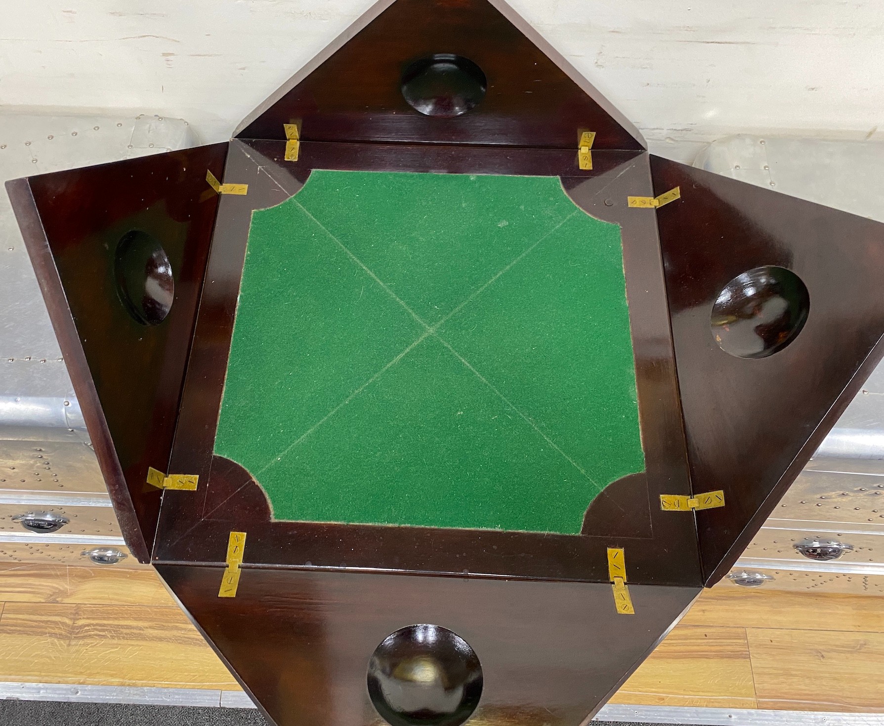 An Edwardian mahogany envelope card table, width 51cm
